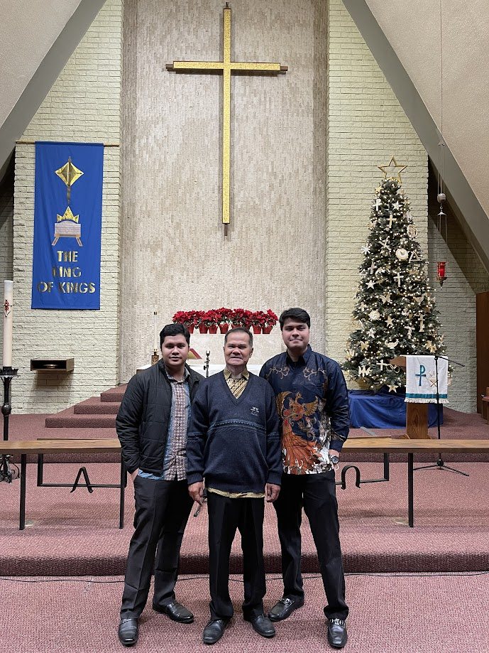 Standing in the sanctuary beneath the cross at Christmas