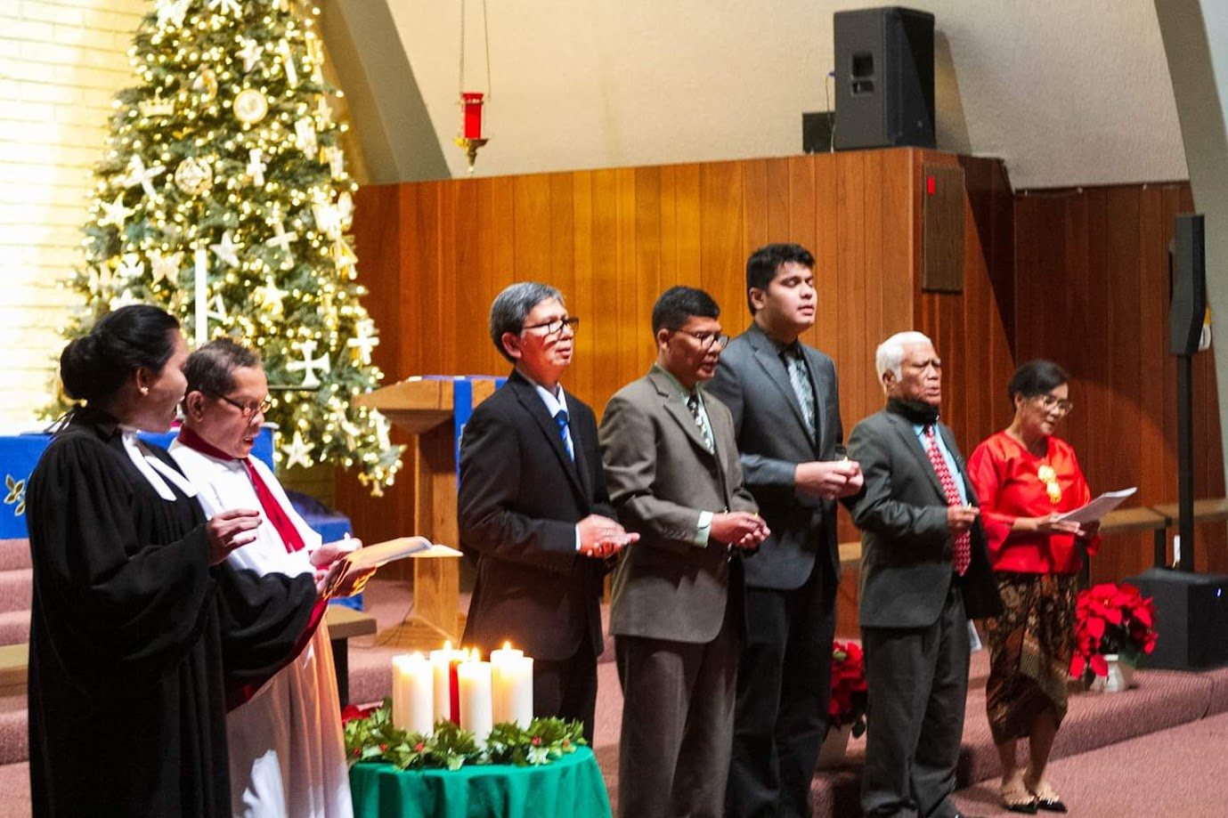 Advent candle lighting during a Christmas Eve service