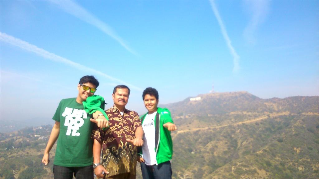 Three of us on a ridge with the Hollywood sign behind