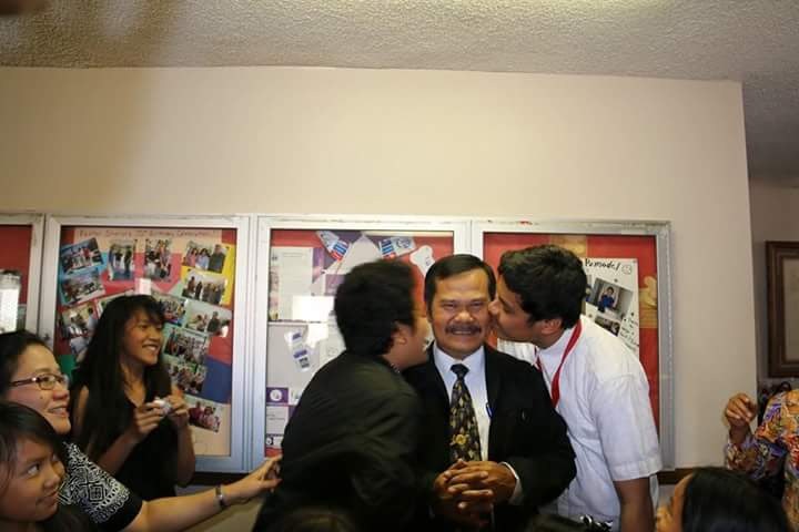 Greeting an elder at a church celebration