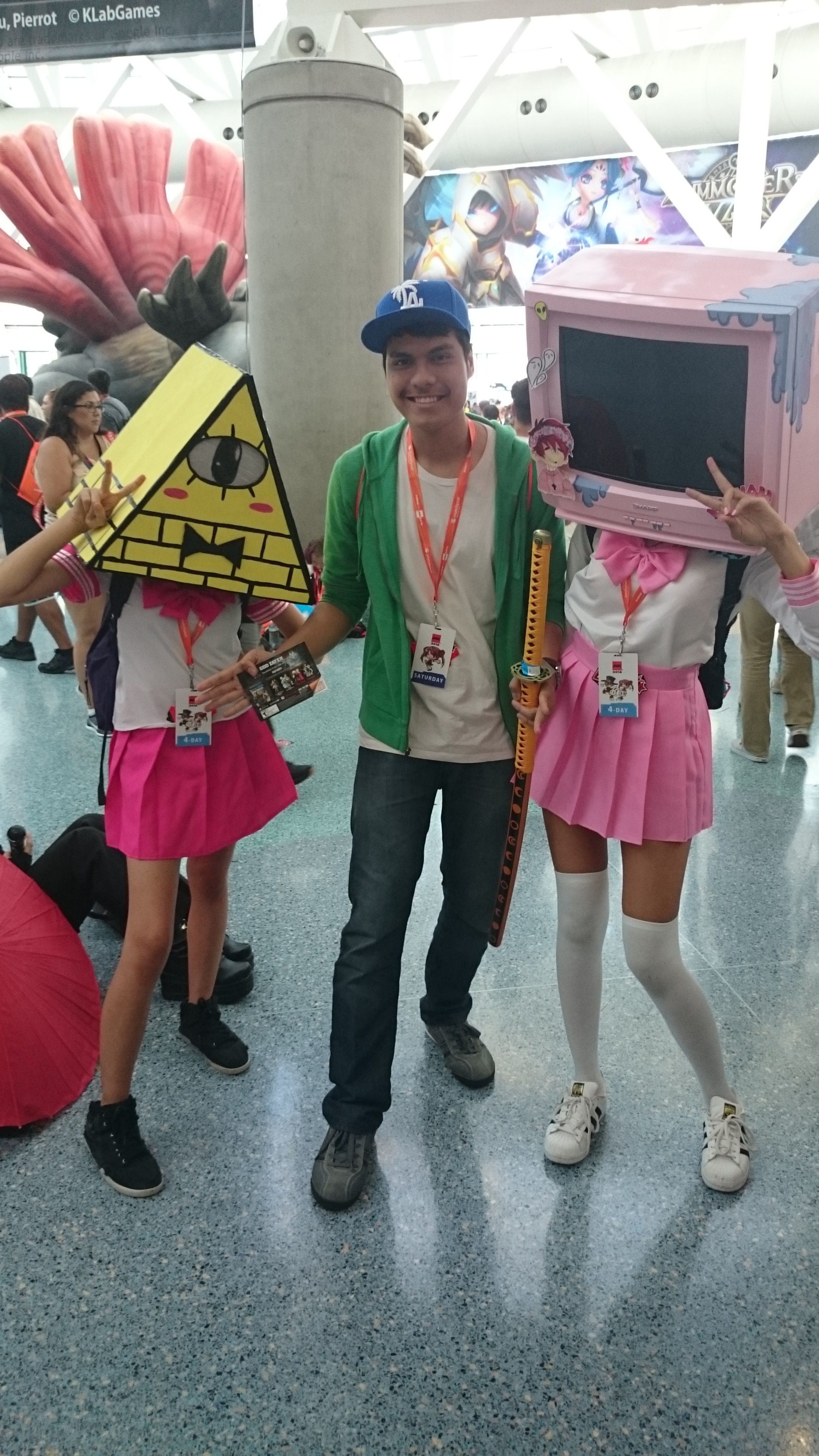 At Anime Expo with two cosplayers, one wearing a television