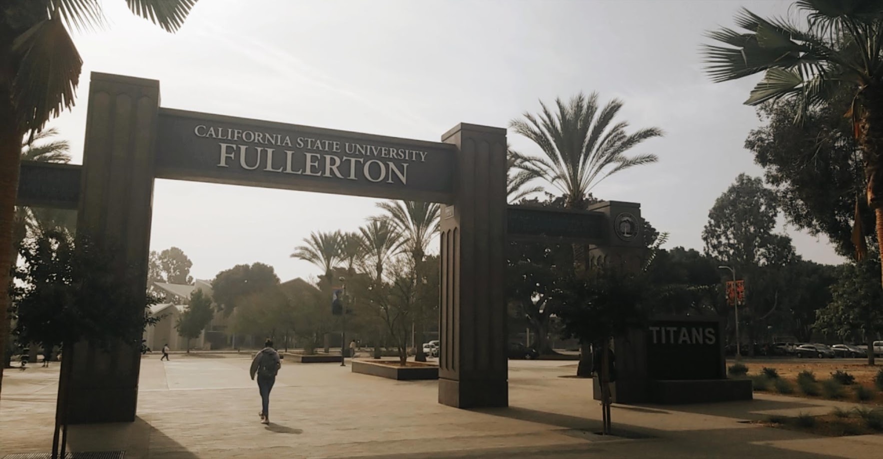 The Cal State Fullerton archway with the Titans marker