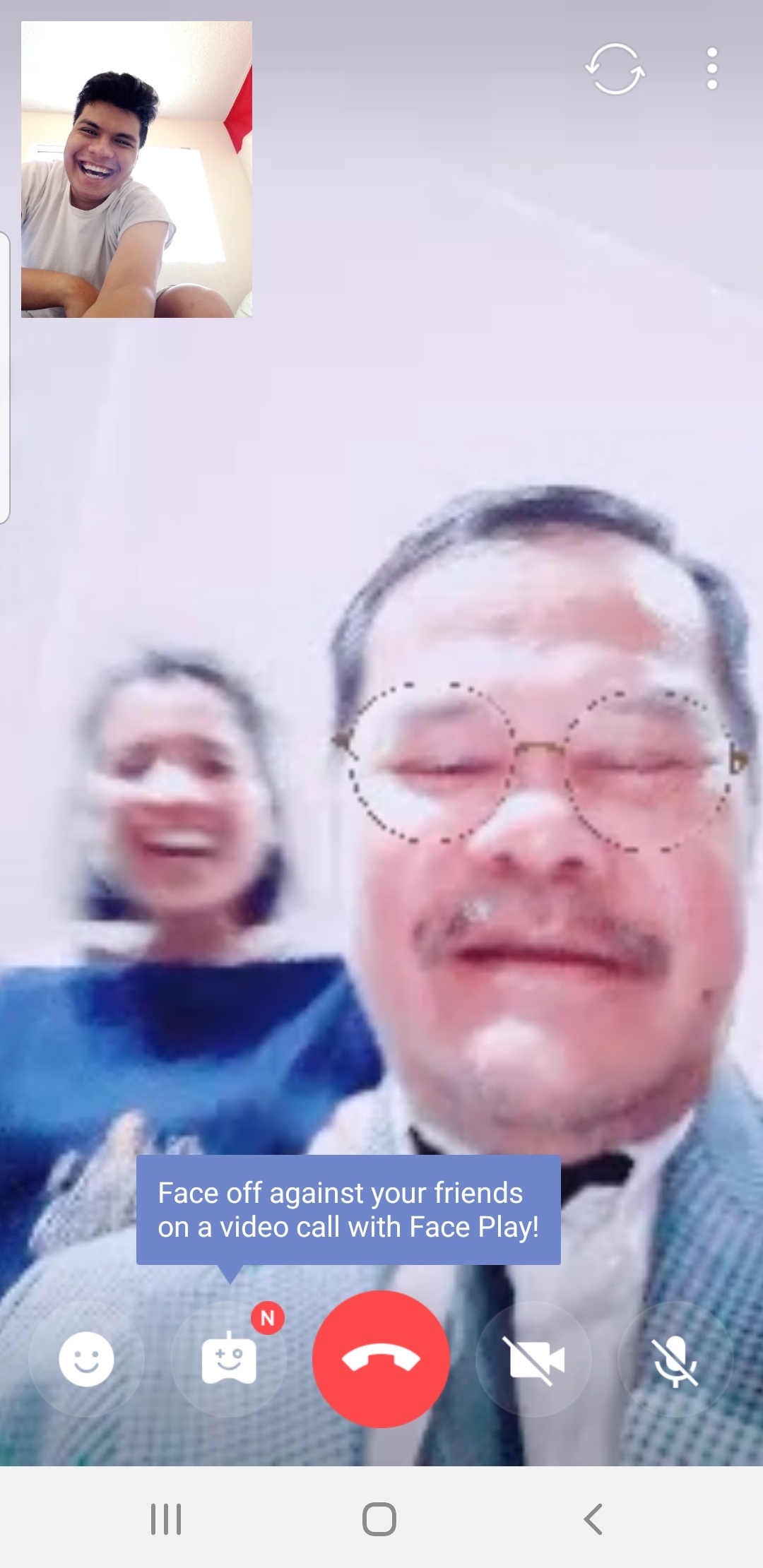 A video call with my parents, everyone wearing a silly face filter
