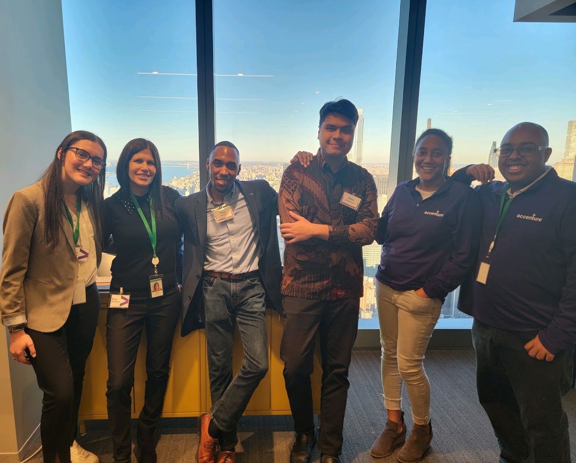 With the Accenture team in front of the New York skyline