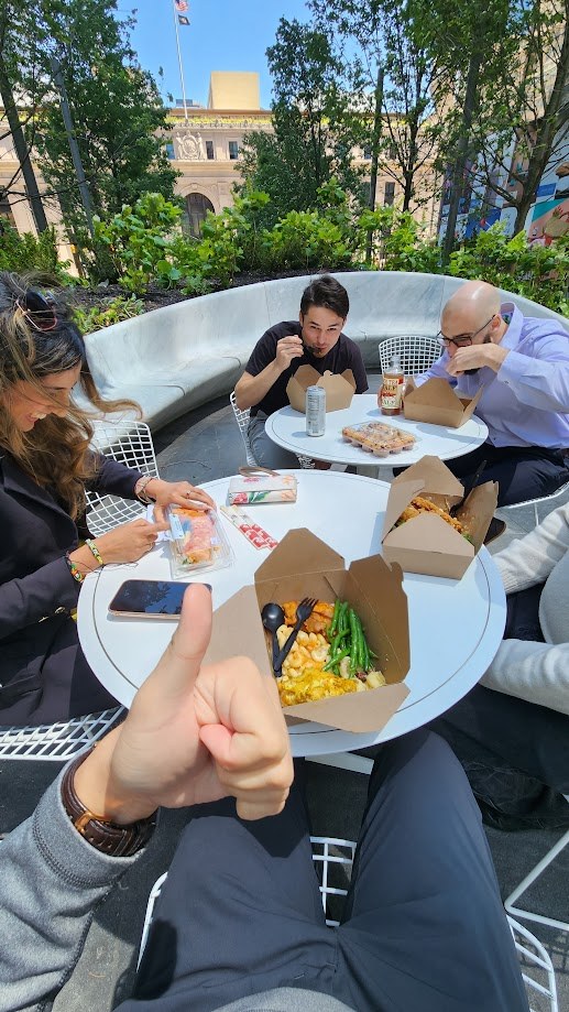 Takeout lunch with colleagues at the outdoor tables