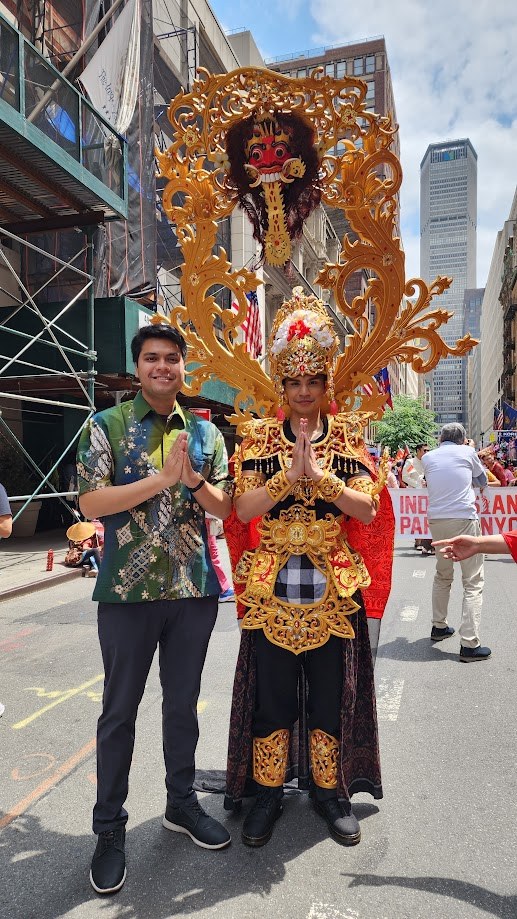 With a Balinese dancer in full costume at the Indonesian Day Parade in New York