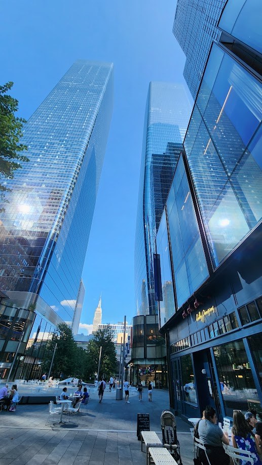 Looking up between the towers of Manhattan West in the late afternoon