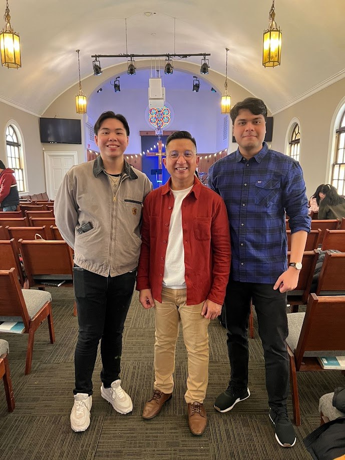 Three of us at the front of the sanctuary after a Sunday service