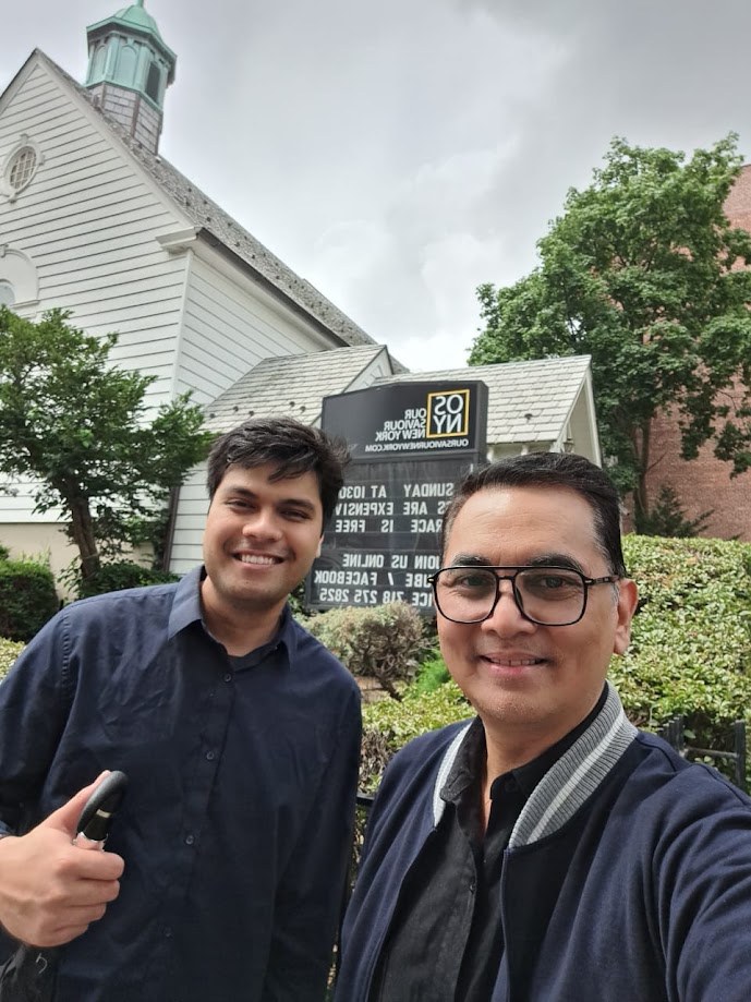 Selfie with a friend outside the Our Saviour New York church sign