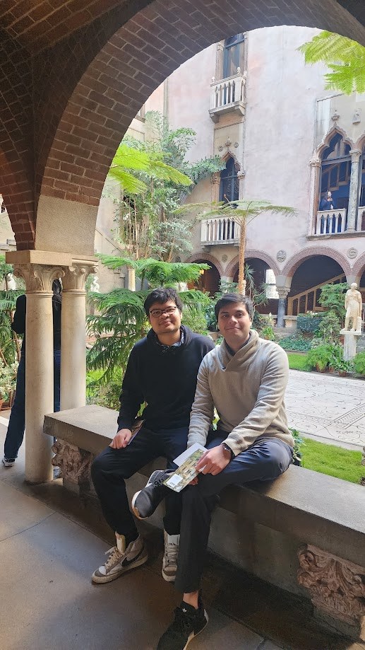 Sitting with a friend in the courtyard of the Isabella Stewart Gardner Museum