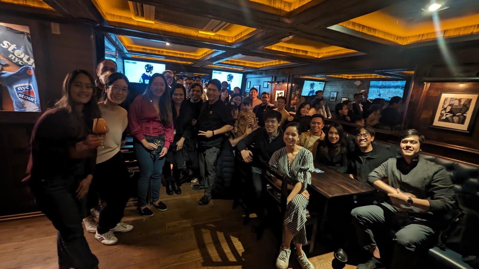 A big crowd of us packed into a wood panelled bar in New York