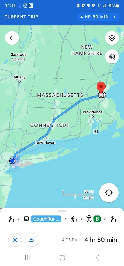 Phone showing the trip to Boston, four hours fifty minutes by coach and train