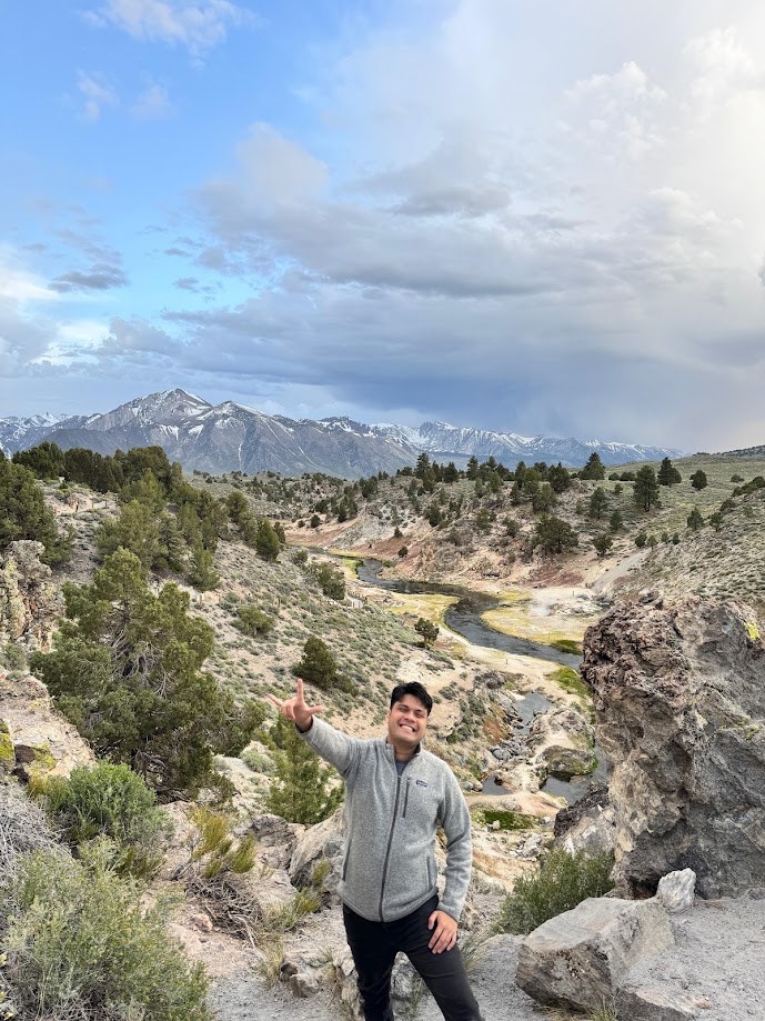 Standing above Hot Creek with the snowy Sierra behind me
