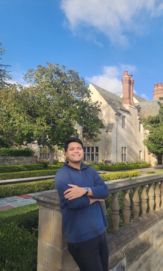 Leaning on the balustrade in the garden at Greystone Mansion