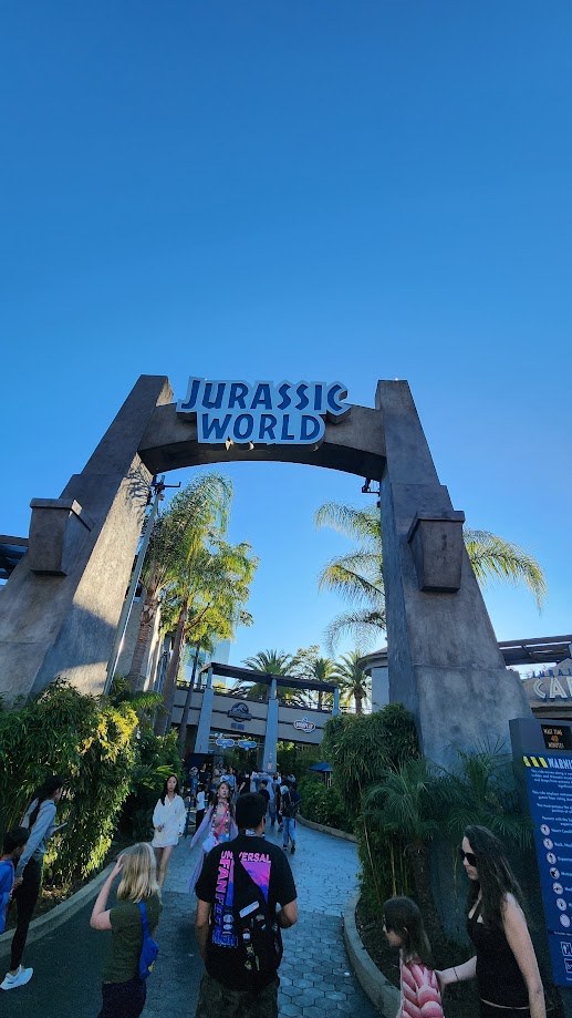 The Jurassic World arch against a clear blue sky